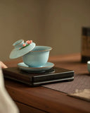 Hand-Sculpted "Azure Petals" Ru Ware Floating Sancai Gaiwan